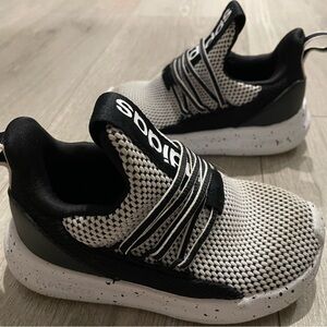 Adidas Black and White Slip-On Sneakers